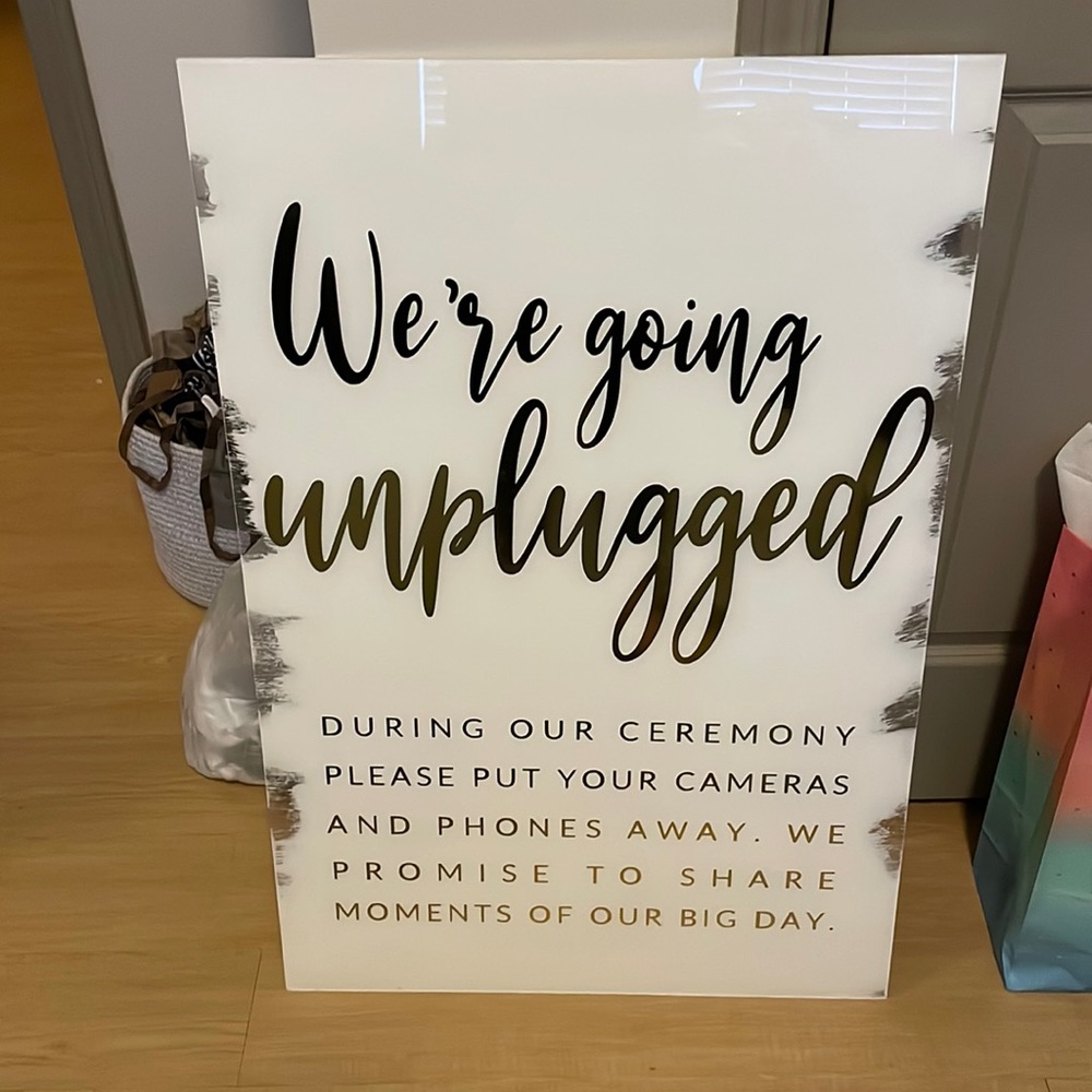 We’re going unplugged wedding sign